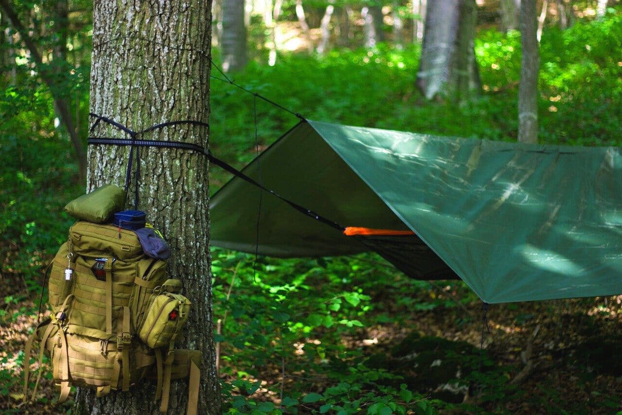 Together or separate, tarps and hammocks provide awesome ways to camp!