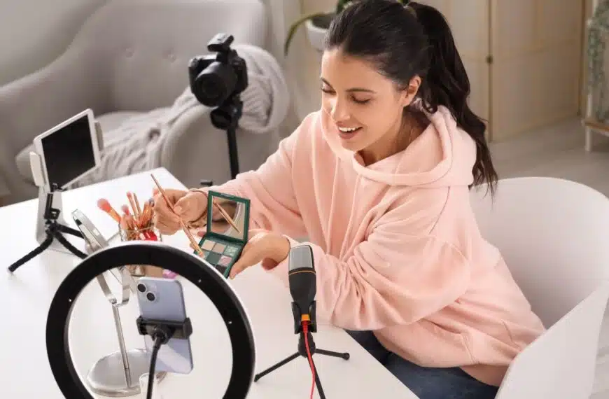 A female content creator recording herself do a makeup routine.